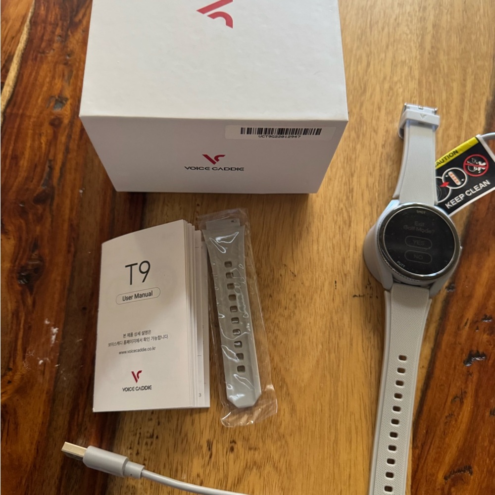 Gray Voice Caddie T9 Golf Smartwatch with Digital Display and Minimalist Design